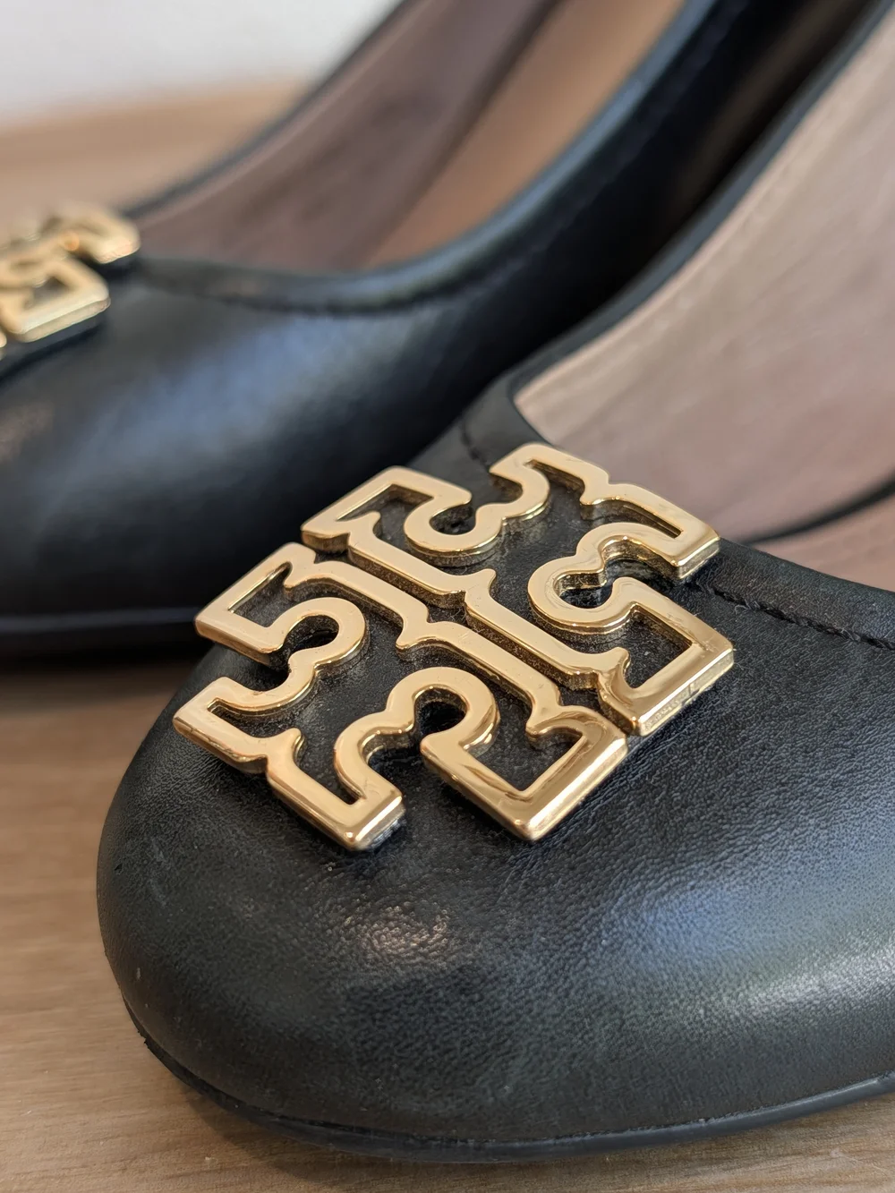 Tory Burch Black Leather Wedge Pumps with Gold Logo Accent